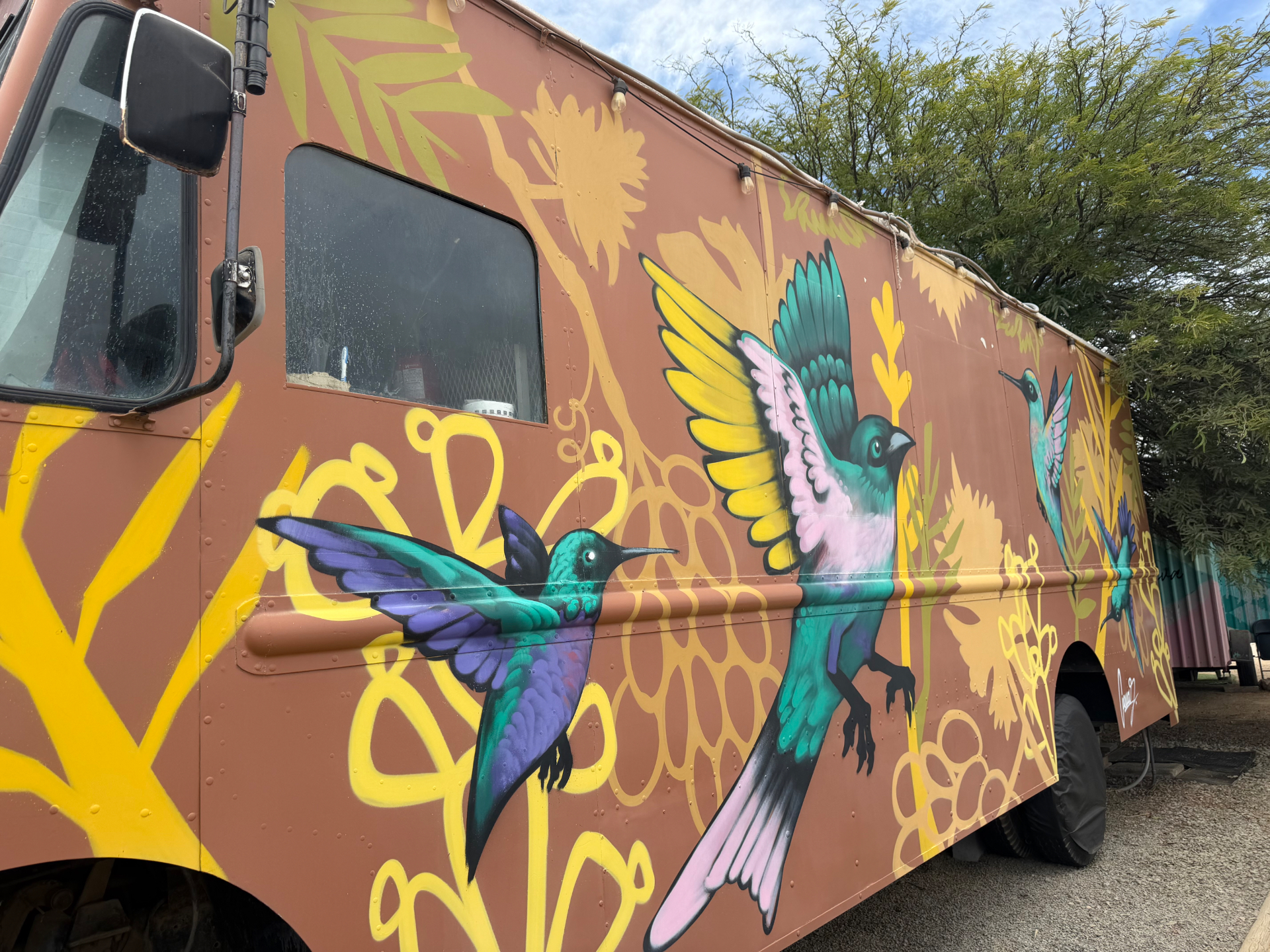 Hummingbird mural on the Adobe Food Truck in the Valle.