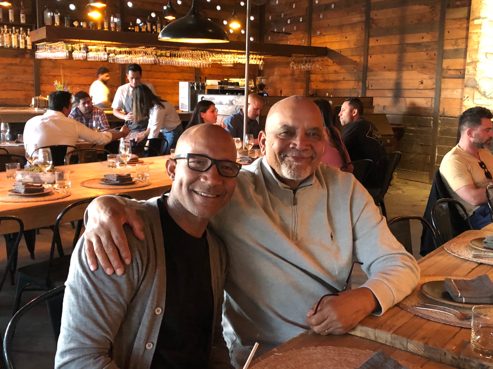 Wilcil Joseph with his father at a Valle restaurant.