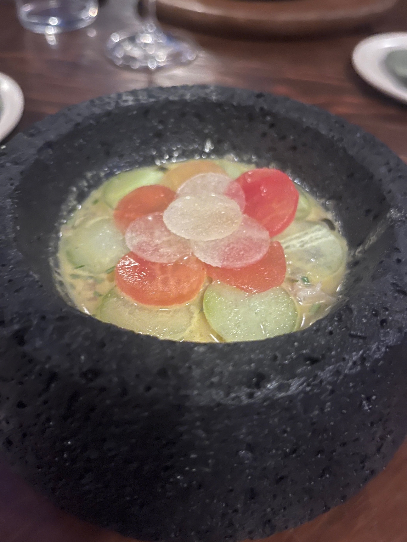 Crudo served in a stone molcajete.