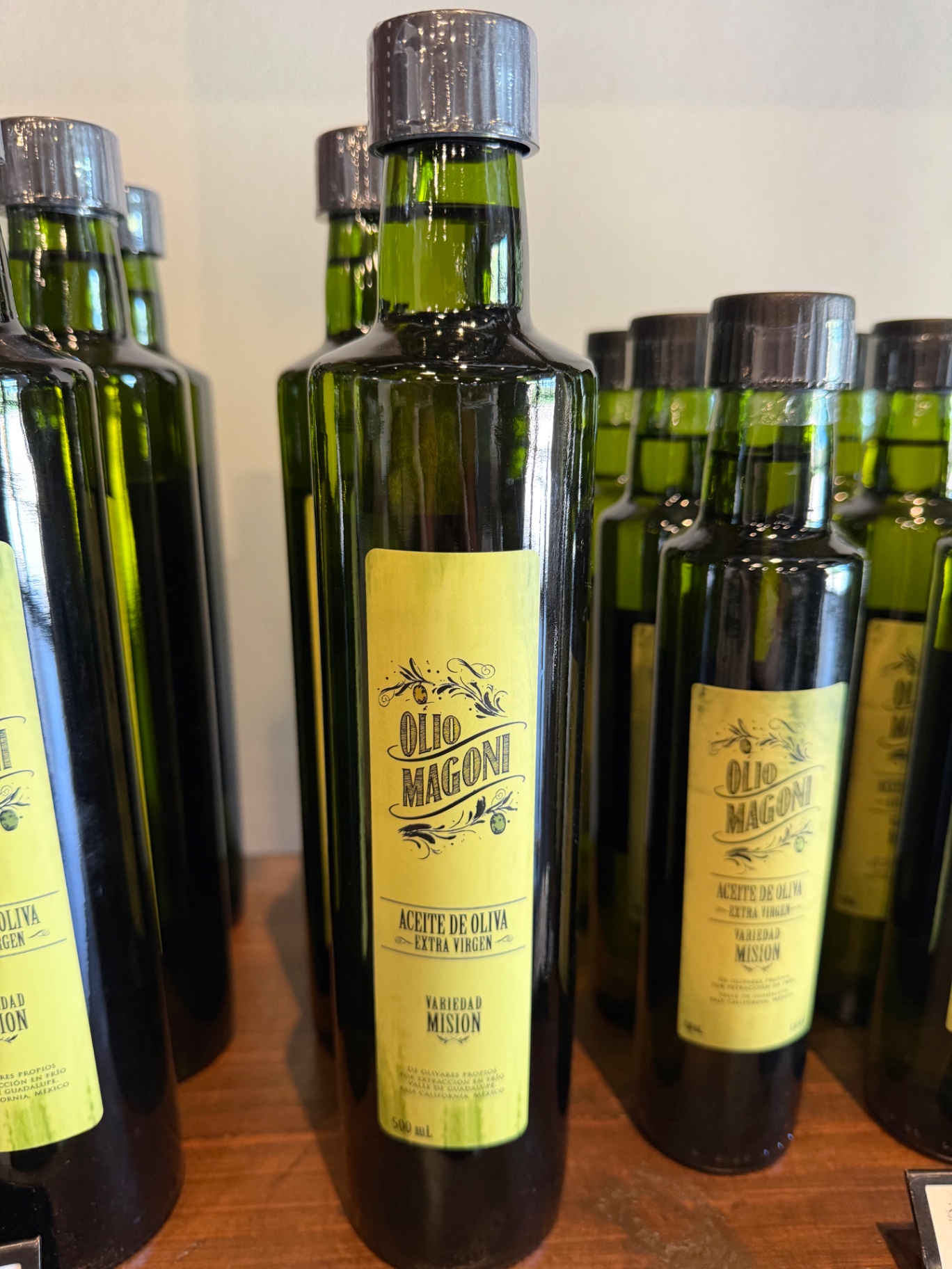 Bottles of Olio Magoni olive oil.